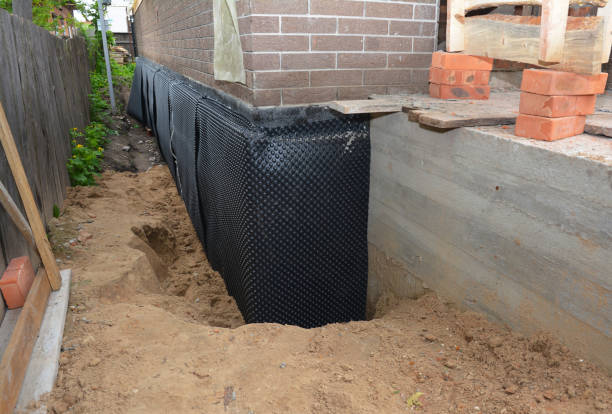Happy homeowners after waterproofing job in Highwood